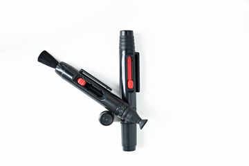 Lens pencil isolated on white background. View from above