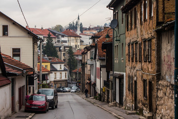 Naklejka na ściany i meble Narrow street in the historic district of Sarajevo in autumn. Bosnia and Herzegovina