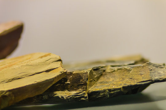 Shale mineral stone specimen from mining and quarrying industries. Shale is a fine-grained, clastic sedimentary rock composed of mud that is a mix of flakes of clay minerals.
