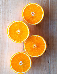 Set of fruits, Slice of fresh oranges against on wood background.