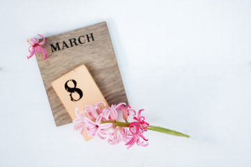 Obraz premium March 8, international, women's day, holiday, number and flower in a vase