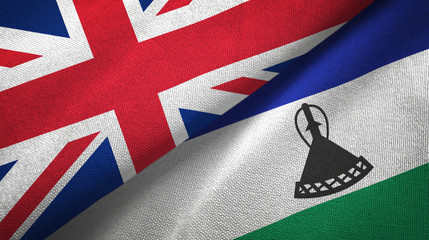 United Kingdom and Lesotho two flags textile cloth, fabric texture