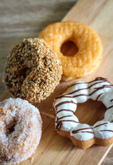 Donuts on wooden background