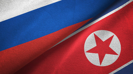 Russia and North Korea two flags textile cloth, fabric texture