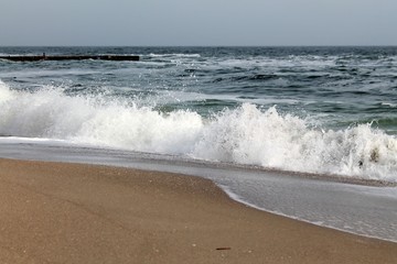 breakwater in the sea and strong waves