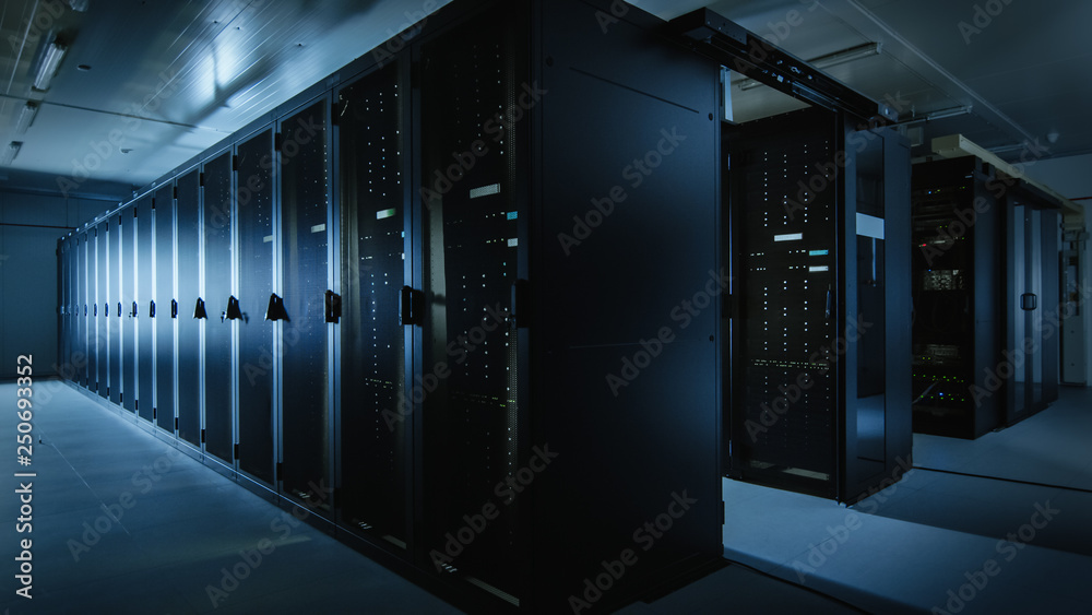 Aufkleber Shot of a Working Data Center With Rows of Rack Servers. Led Lights Blinking and Computers are Working. Dark Ambient Light.
