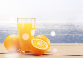 Orange Juice in glass on background