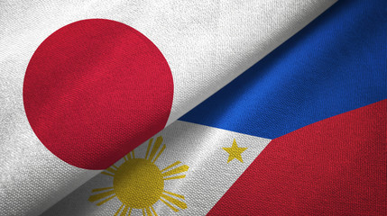 Japan and Philippines two flags textile cloth, fabric texture