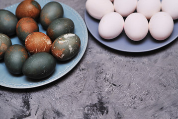 Fototapeta na wymiar Eggs in plate on stone background.