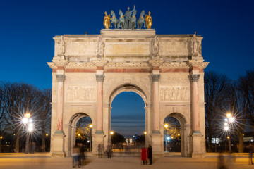 Fototapeta na wymiar Paris, France - 02 17 2019: Triumphal arch of carousel at sunset