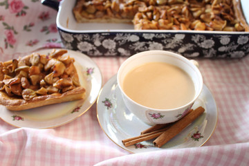 cup of coffee and cookies on wooden table
