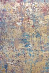 old wall with removed wallpaper and rest of paint