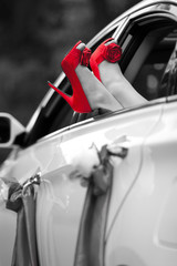 Beautiful red bridesmaid shoes from the car window