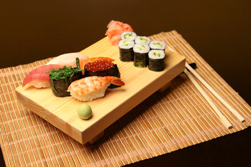 set of real classic Japanese sushi. on a wooden surface