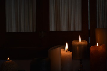 Candles in a dimly lit room