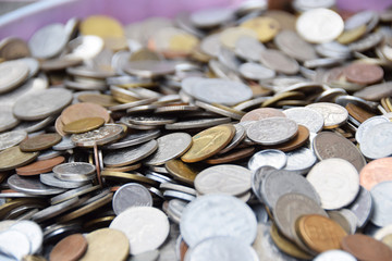 old coins from various parts of the world withdrawn from circulation