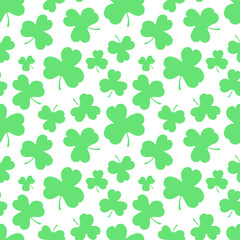 Seamless pattern of green leaves clovers to St. Patrick Day. Hand-drawn vector illustration of clover for Irish holiday, background, invitation, typography, print, textile, wrapping paper.