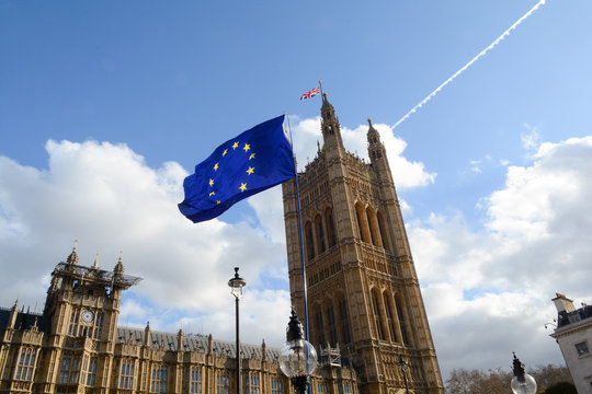 E.U. Flag flying in front of Union ack flag at Houses of Parliament London