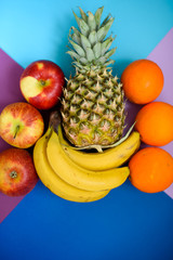 Exotic fruit on a colorful background. Fresh and fragrant fruit. Summer.