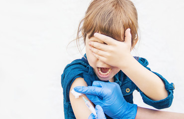 vaccination of children. An injection. Selective focus.