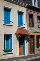 Fototapeta premium Old houses in Etretat on a sunny day in summer