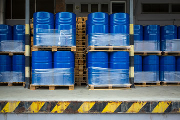 Toxic waste/chemicals stored in barrels at a plant - cans with chemicals, industry oil barrels,...