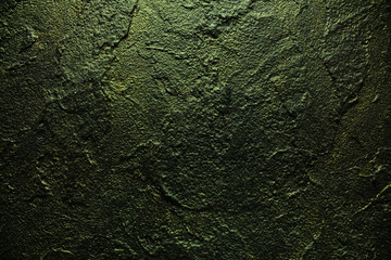 abstract colorful grunge background. The texture of the wall of decorative stucco. modern and fashionable clothes for walls