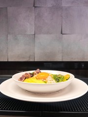 Egg scramble with rice, yolk, white fish fillet, corn and avocado. High resolution picture perfect for cooking book, receipt book or food magazine.