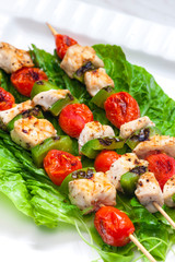 still life of meat skewers