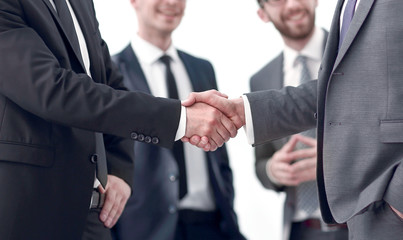 successful business partners shaking hands