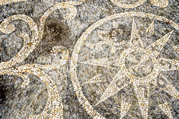 black and white pebble mosaic floor