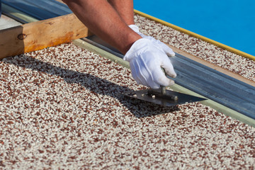 Laying the floor around the outdoor pool.