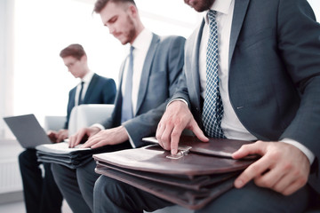 Fototapeta premium close up.a group of business people sitting in the office waiting room