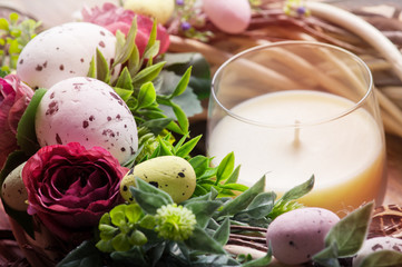 Obraz na płótnie Canvas Easter DIY wreath with eggs and flowers