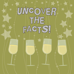 Text sign showing Uncover The Facts. Conceptual photo disclose or reveal truth about event or current situation Filled Cocktail Wine Glasses with Scattered Stars as Confetti Stemware