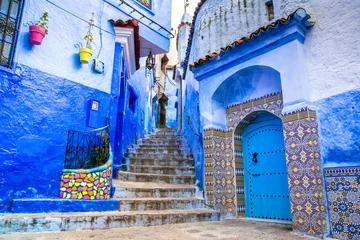 Photo sur Plexiglas Maroc Vue imprenable sur la rue de la ville bleue de Chefchaouen. Lieu : Chefchaouen, Maroc, Afrique. Image artistique. Monde de la beauté