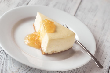 Traditional cheesecake on the wooden table