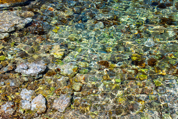 Transparent water in shallow waters at sea. Clean water in the sea. Nature concept with clean sea waters