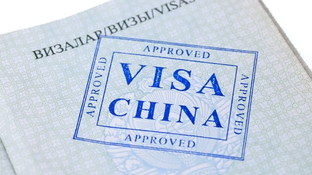 put a stamp in the passport: China visa, approved