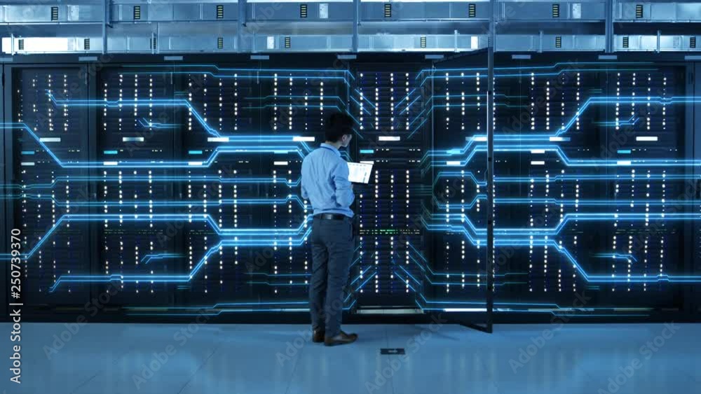 Poster IT Specialist Standing In front of Server Racks with Laptop, He Activates Data Center with a Touch Gesture. Animated Concept of Digitalization of Information: Network of Lines Spreading Symmetrically