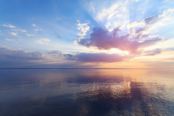 Fototapeta premium early morning sunrise on a choppy river / wind early spring landscape