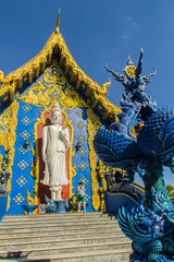 Beautiful public Buddhist church at Wat Rong Sua Ten in Chiang Rai, Thailand. Wat Rong Suea Ten (Temple of Tigers Leaping over Channel) or the Blue Temple is above all its magnificent blue interior.