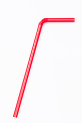 Red straw isolated on white background