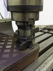 face milling tools ready to work on a metal plate