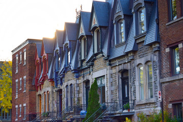 Famous Montreal Colorful Houses. Colorful facades in french Canada. Blue houses. Red houses. Traditional buildings in Quebec