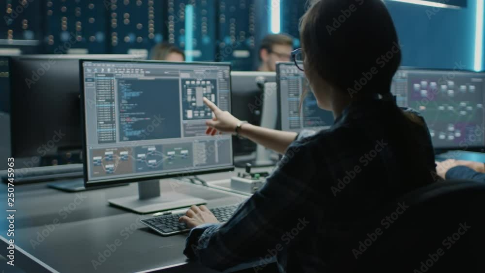 Poster Team of IT Programers Working on Desktop Computers in Data Center Control Room. Young Professionals Writing on Sophisticated Programming Code Language