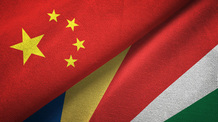 China and Seychelles two flags textile cloth, fabric texture