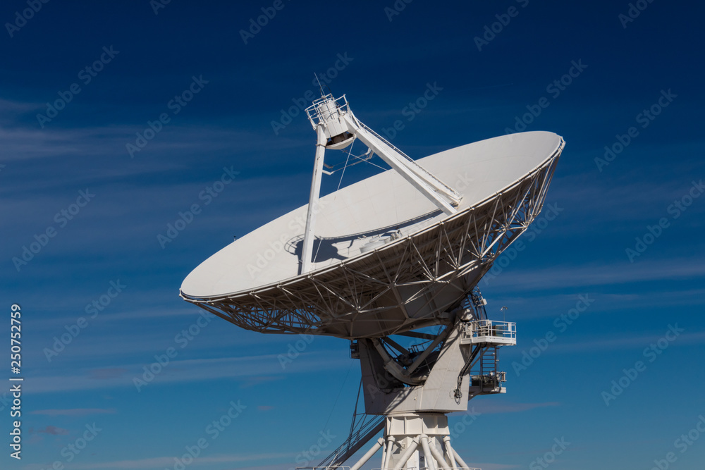 Canvas Prints very large array centered view of vla radio antenna dish isolated against a deep blue sky, horizonta