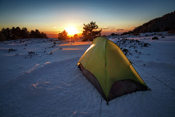 Tent On The Snow At The Sunset