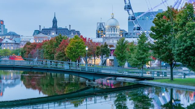 Twilight to night timelapse of the beautiful fall color with the La Grande Roue de Montreal observation ferris wheel